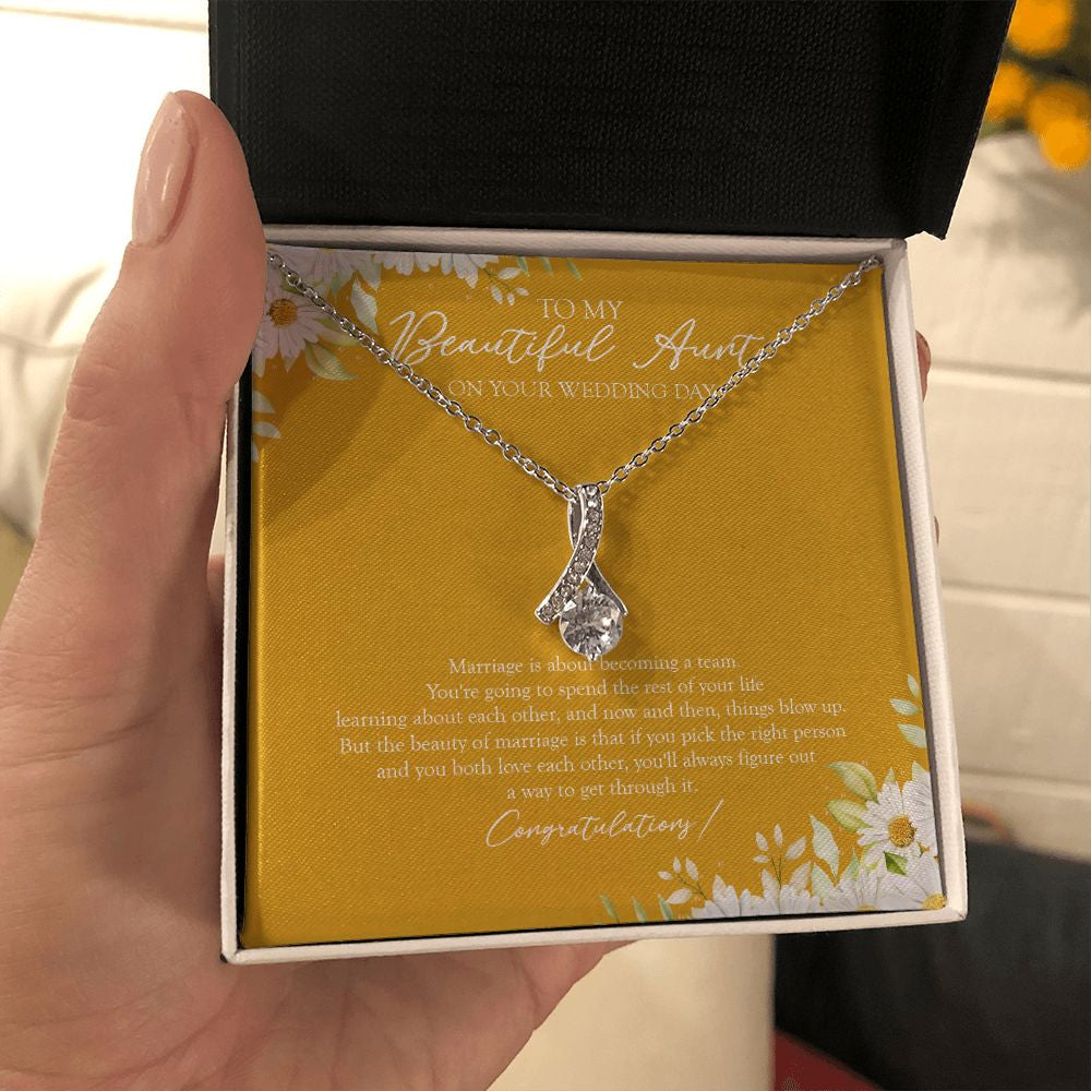 Becoming A Team alluring beauty necklace in hand