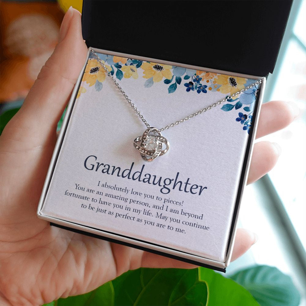 Beyond Fortunate To Have You love knot necklace in hand