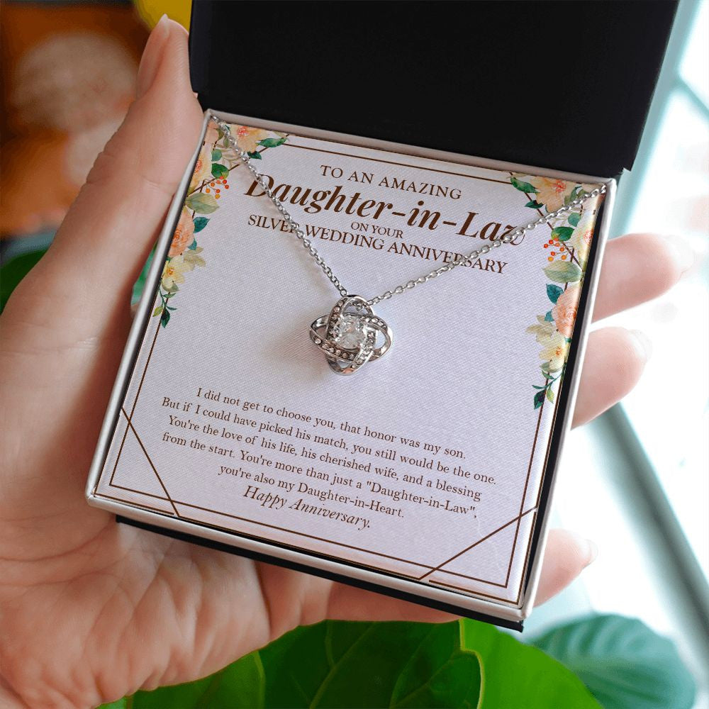 Daughter-In-Heart love knot necklace in hand