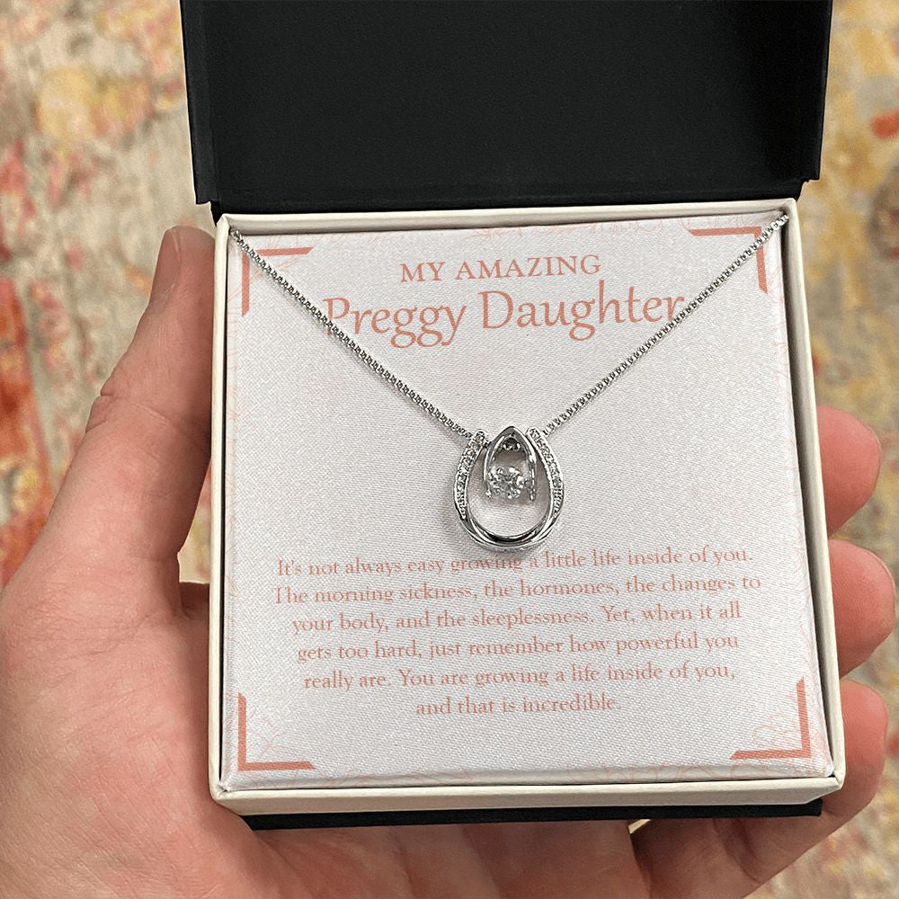 Little Life Inside Of You horseshoe necklace in hand
