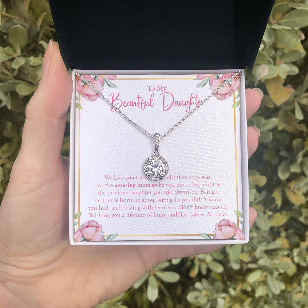 Amazing Mom-To-Be eternal hope necklace in hand