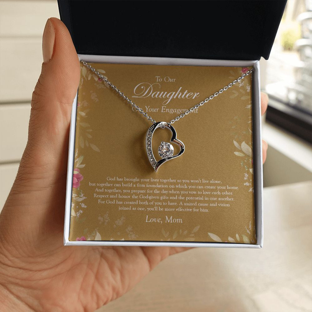God Given Gifts forever love silver necklace in hand