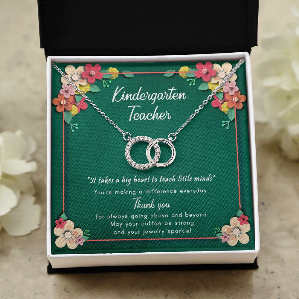 Teach Little Minds double circle necklace close up