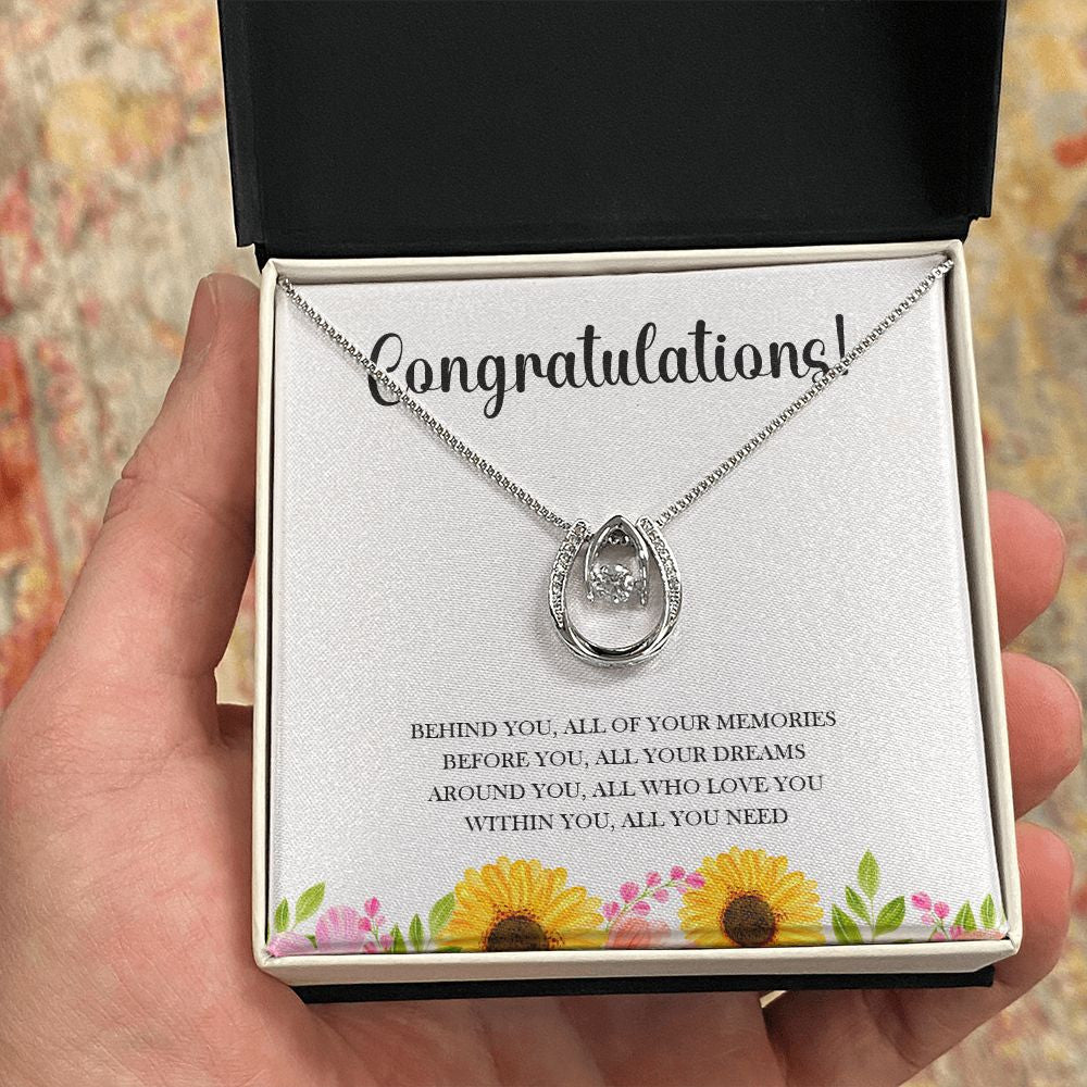 All You Need horseshoe necklace in hand