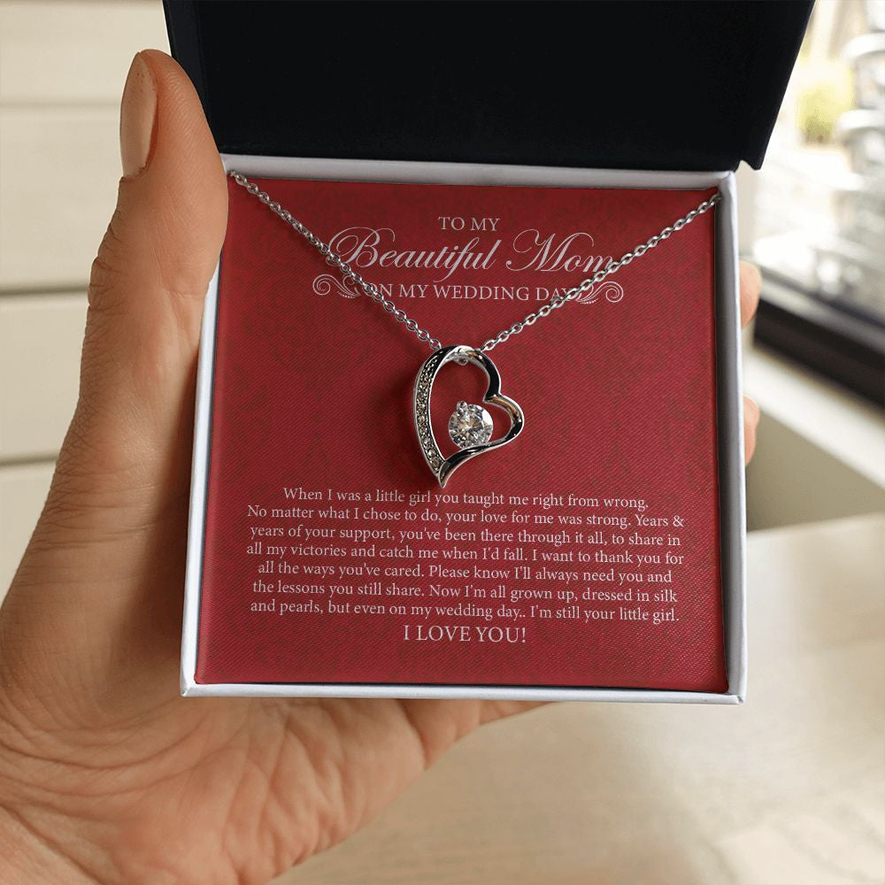 Dressed In Silk And Pearls forever love silver necklace in hand