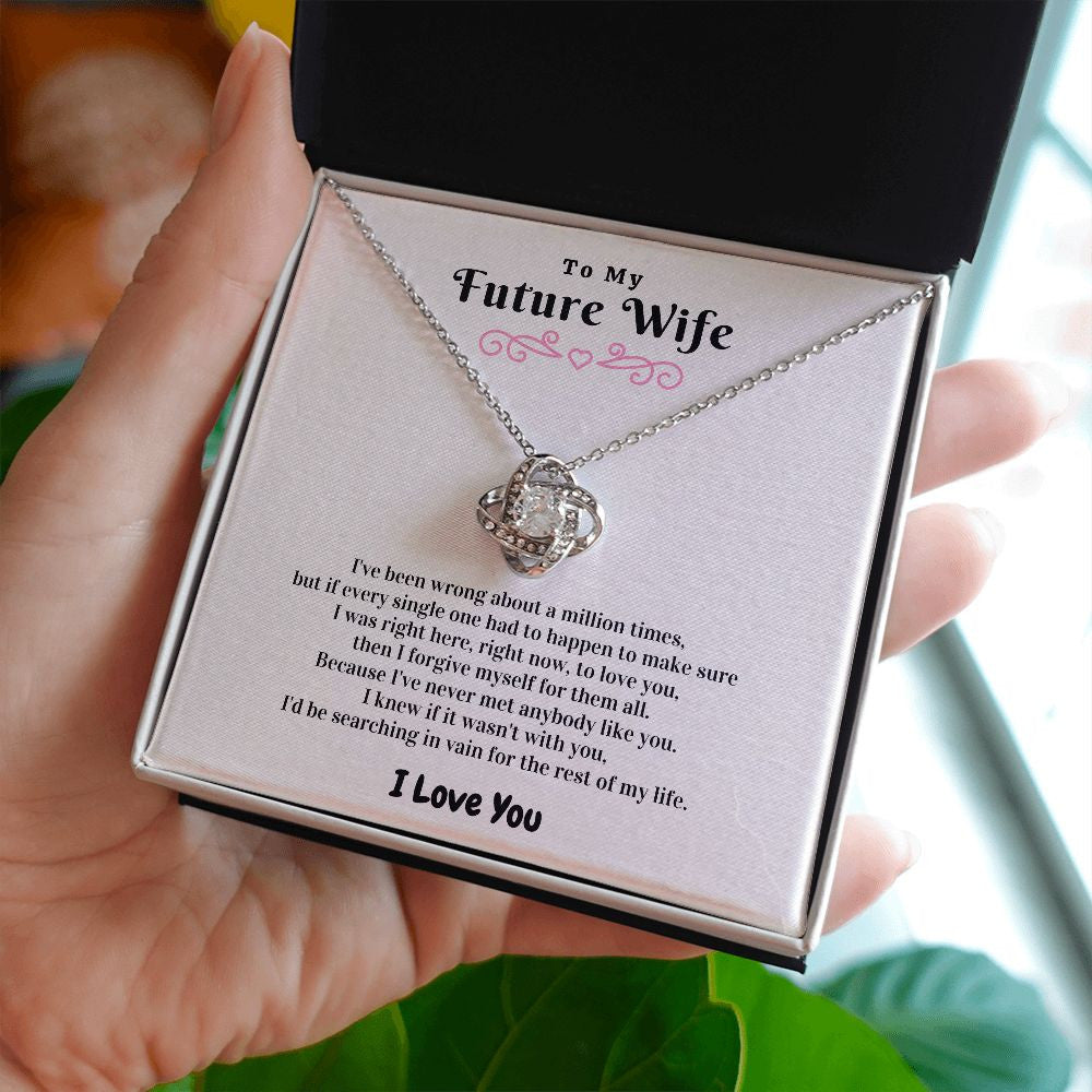 Right Here To Love You love knot necklace in hand