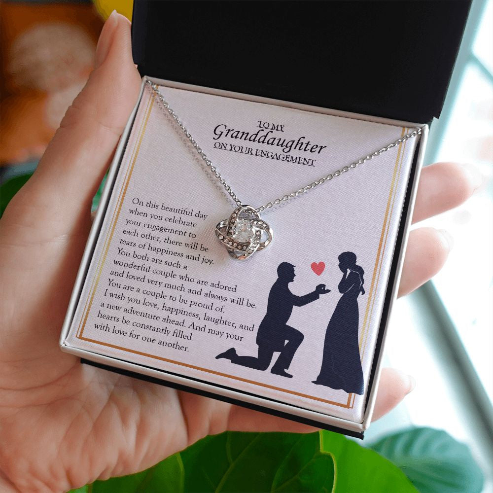 Wonderful Couple Who Adored love knot necklace in hand