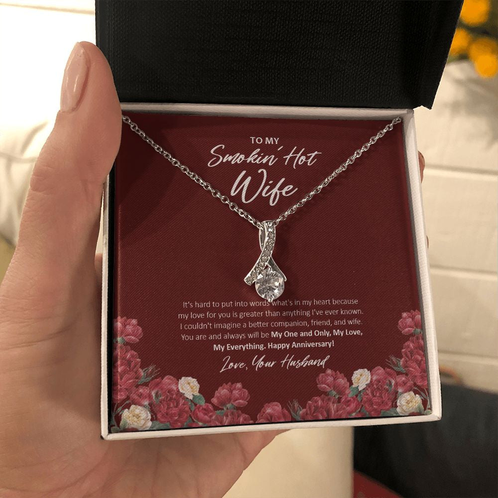 Greater Than Anything alluring beauty necklace in hand