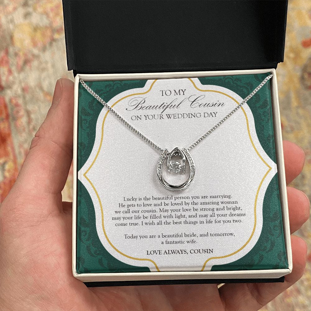 Life Filled With Light horseshoe necklace in hand