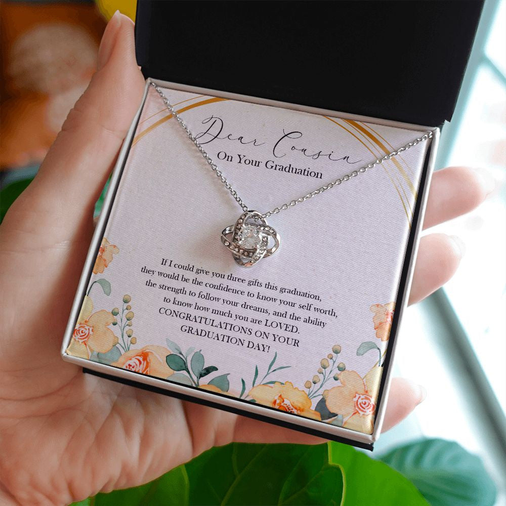 Give You Three Gifts love knot necklace in hand