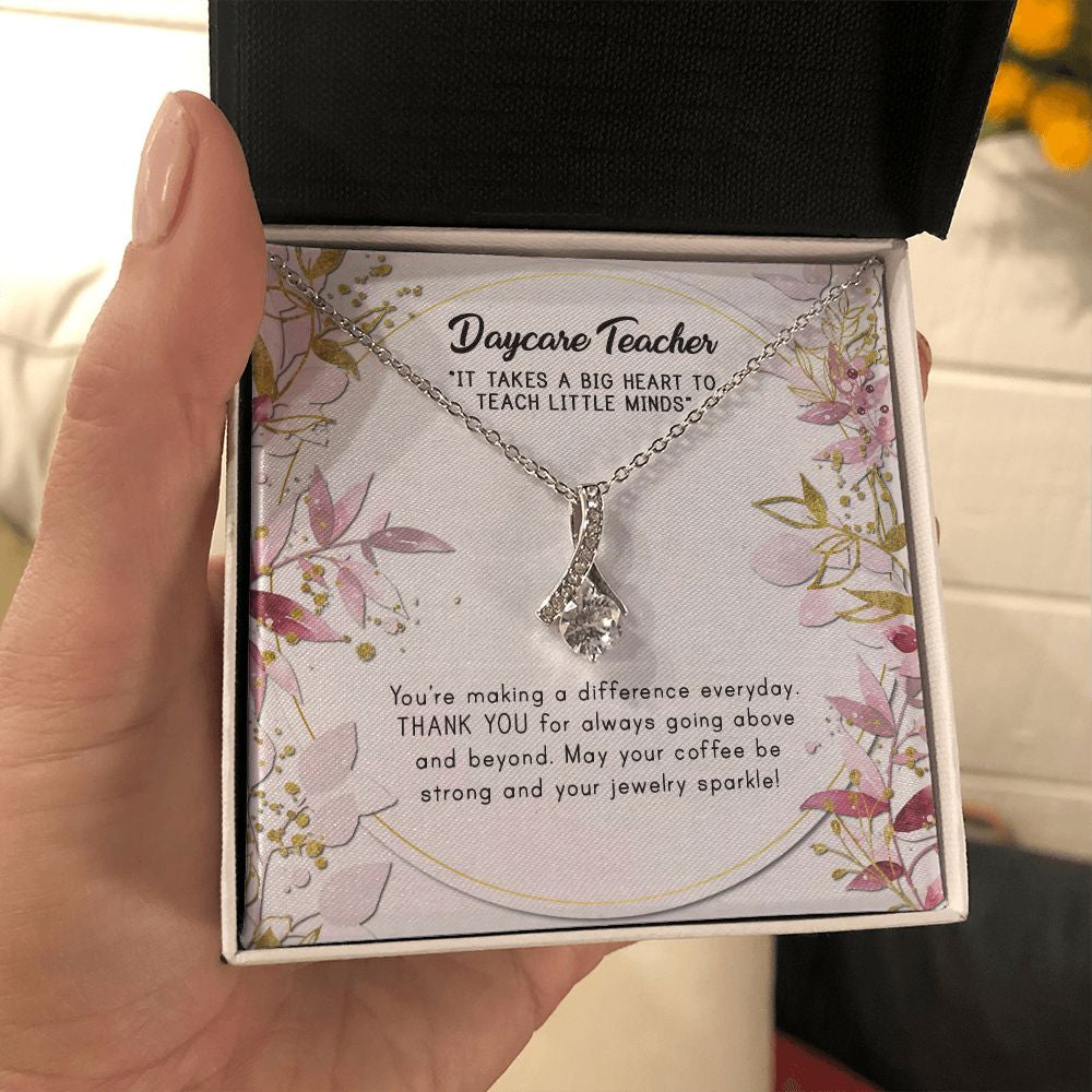 Teach Little Minds alluring beauty necklace in hand