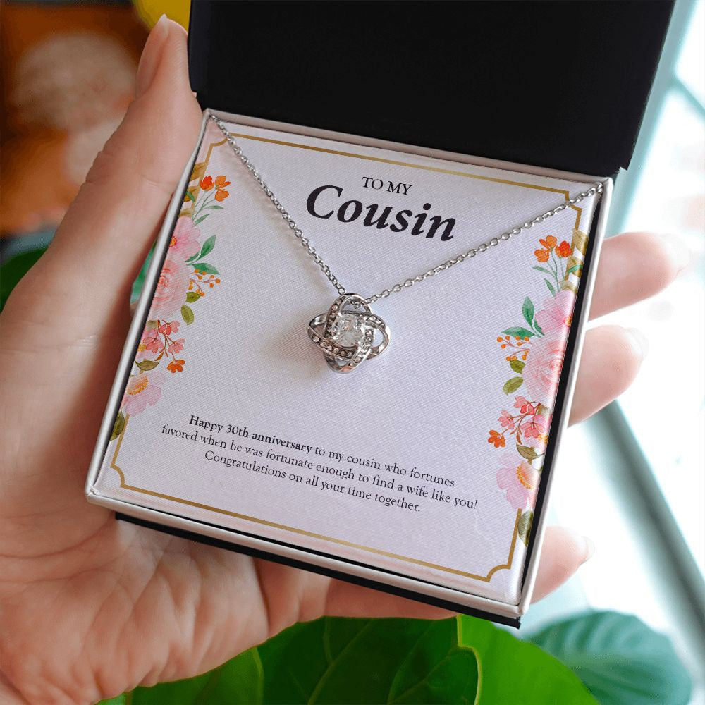 Fortunate To Find love knot necklace in hand