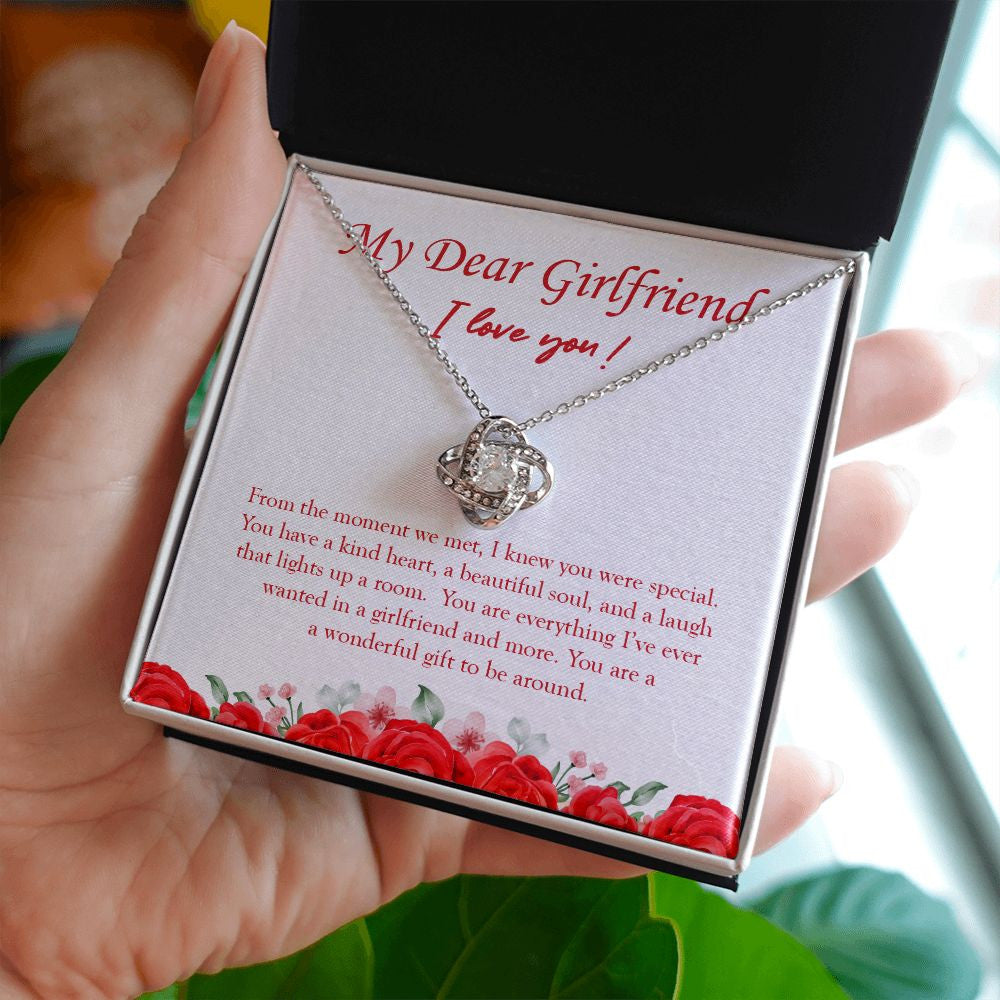 Wonderful Gift To Be Around love knot necklace in hand