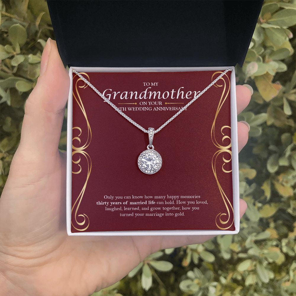 Marriage Into Gold eternal hope necklace in hand