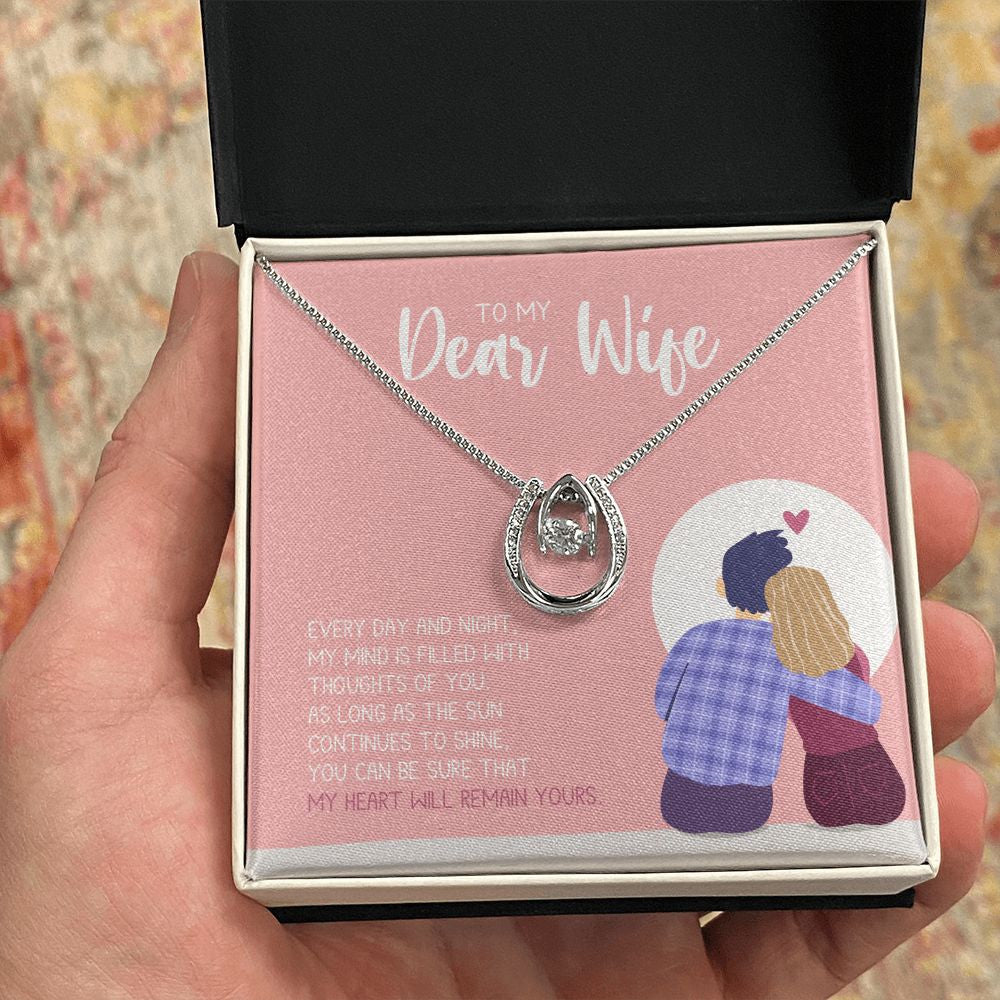 Thoughts of you horseshoe necklace in hand