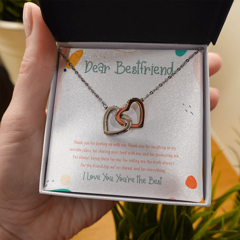 The friendship we shared interlocking heart necklace in hand