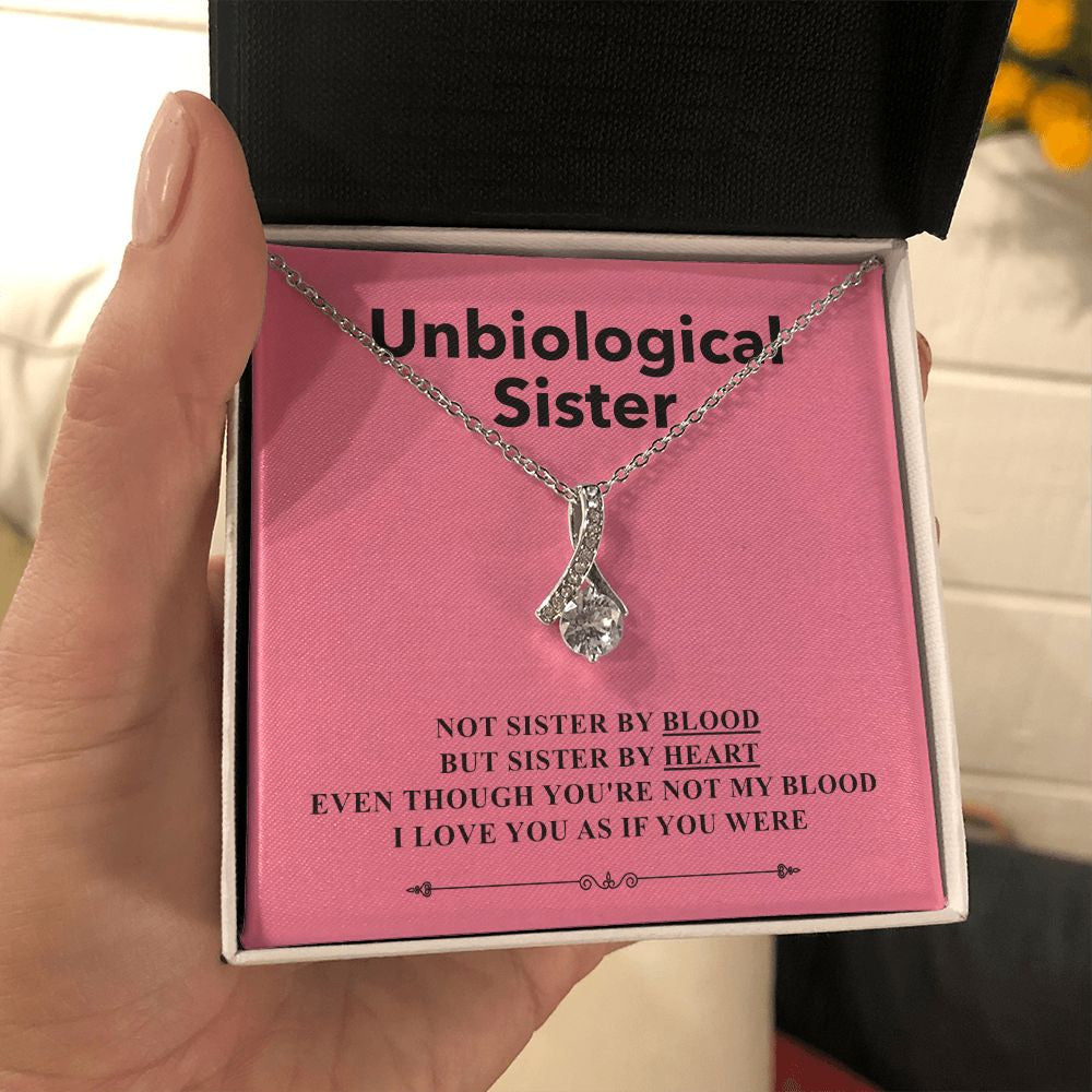 Sister By Heart alluring beauty necklace in hand