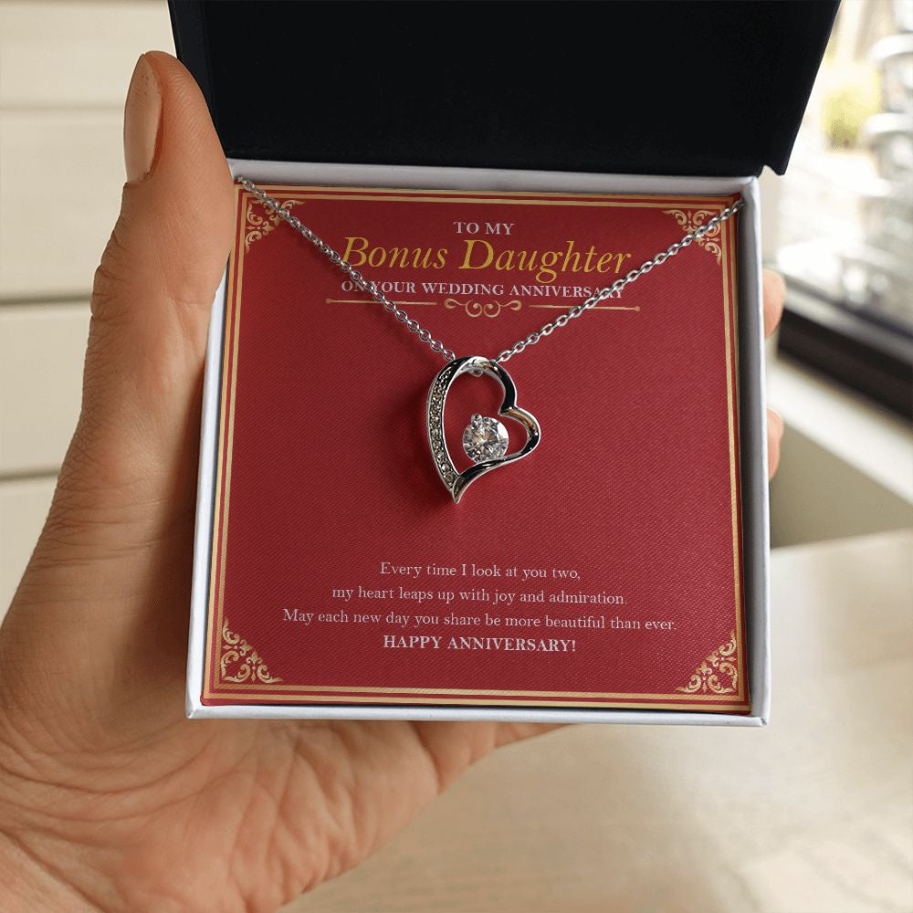 Heart Leaps Up forever love silver necklace in hand