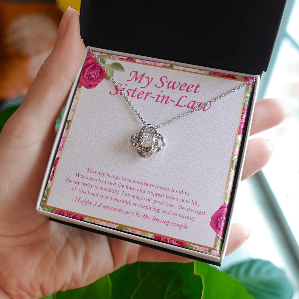 Brings Back Countless Memories love knot necklace in hand