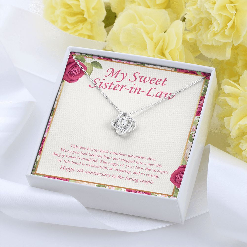 Tied The Knot love knot pendant yellow flower
