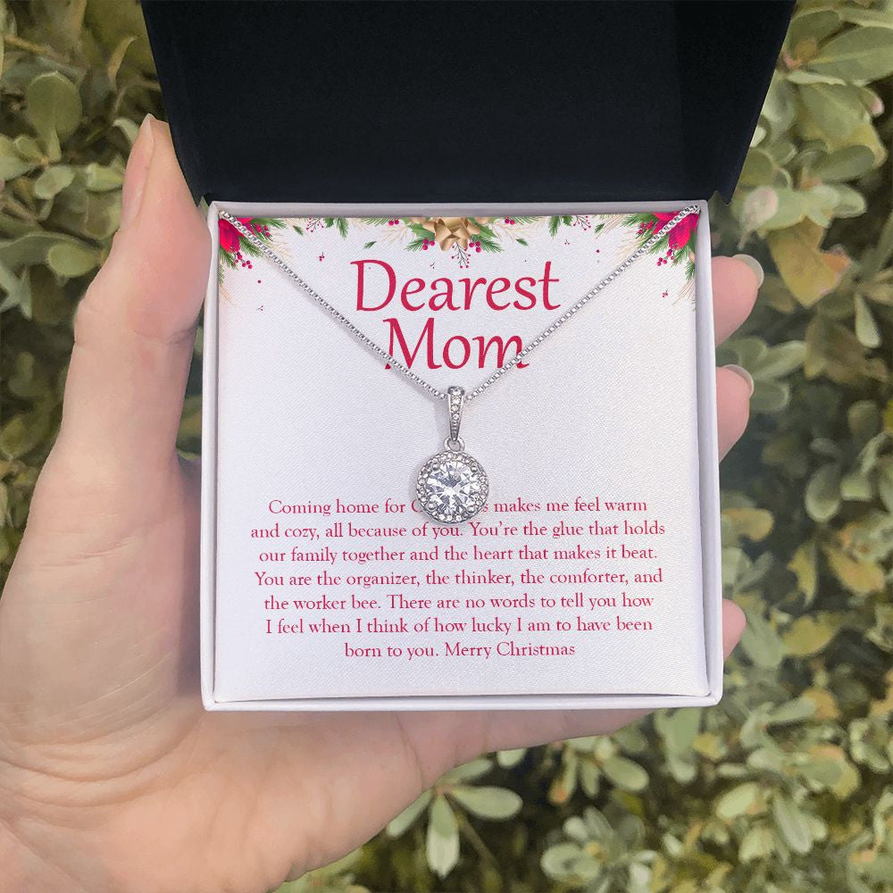 Warm And Cozy eternal hope necklace in hand