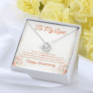 Our Ups And Downs love knot pendant yellow flower