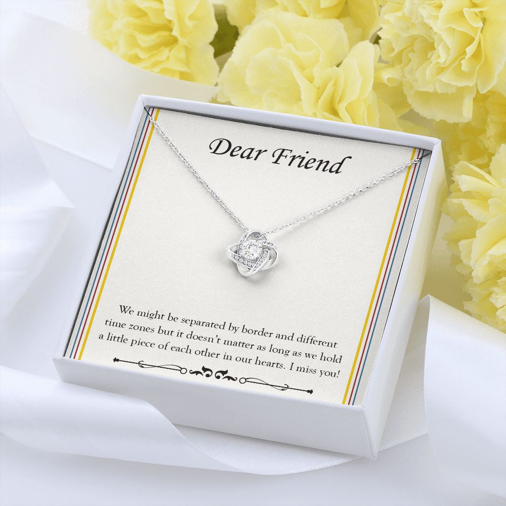 Separated By Border And Time Zone love knot pendant yellow flower