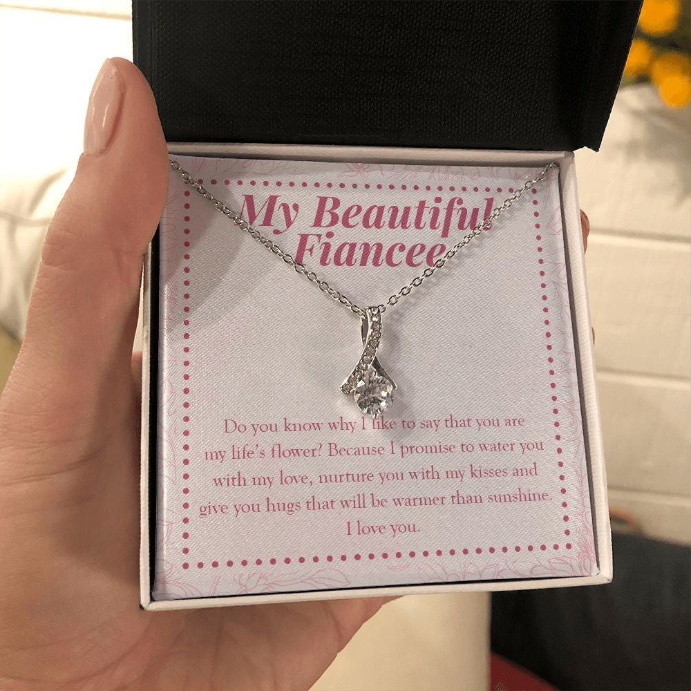 Life's Flower alluring beauty necklace in hand