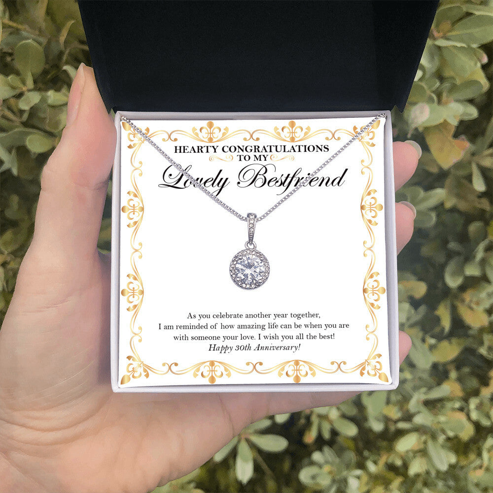 Celebrate Another Year eternal hope necklace in hand