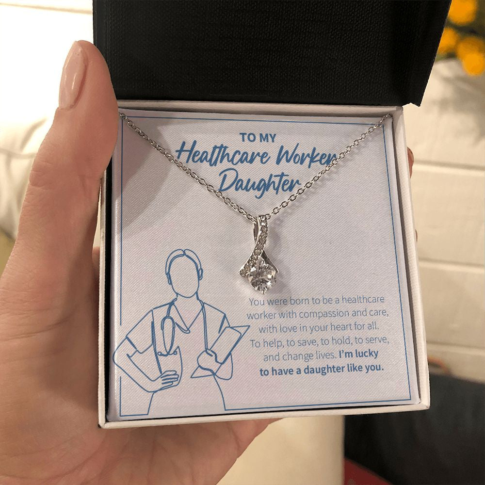 With Compassion And Care alluring beauty necklace in hand