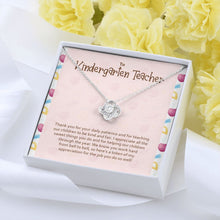 Load image into Gallery viewer, Teaching Our Children love knot pendant yellow flower

