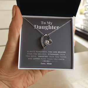 Loved More Than You Know forever love silver necklace in hand