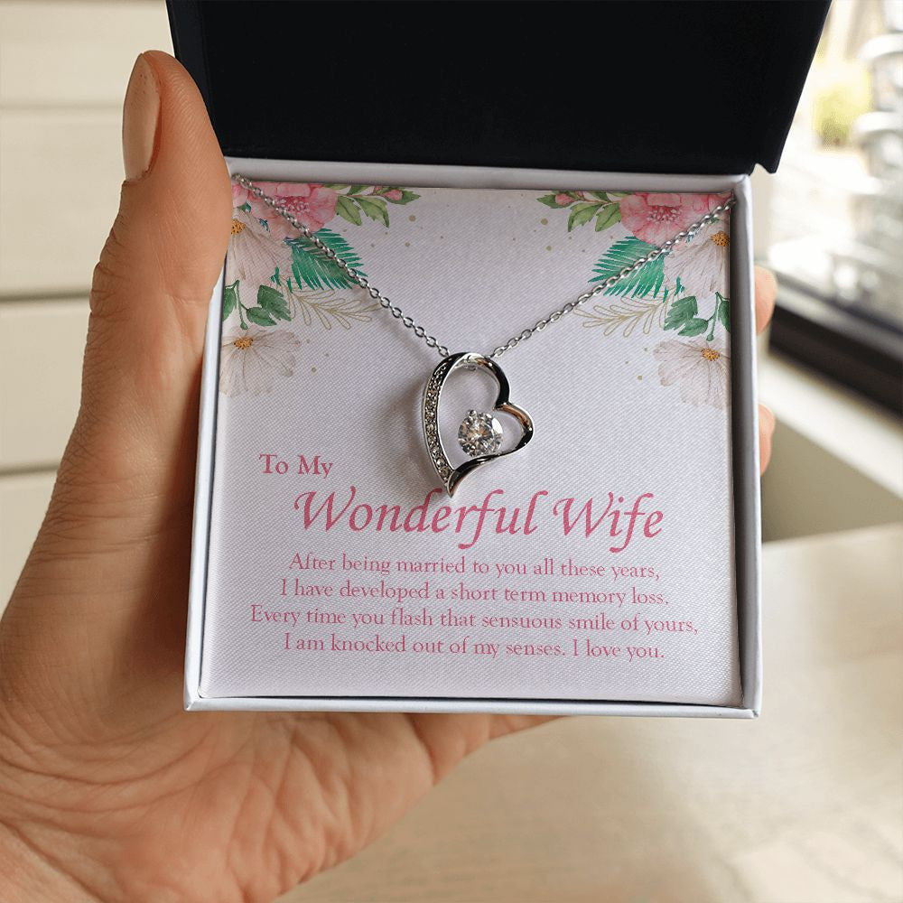 Knocked Out Of My Senses forever love silver necklace in hand