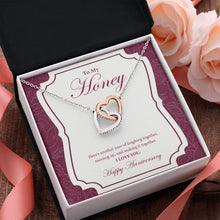 Load image into Gallery viewer, Making It Together interlocking heart pendant pink flower
