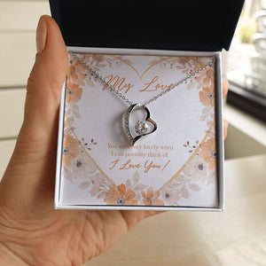 Every Lovely Word forever love silver necklace in hand