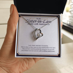 Love, Trust, Tolerance forever love silver necklace in hand