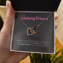 Load image into Gallery viewer, Stage of Life interlocking heart necklace in hand
