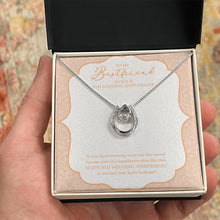 Load image into Gallery viewer, Become Part Of A Happily-Ever After horseshoe necklace in hand
