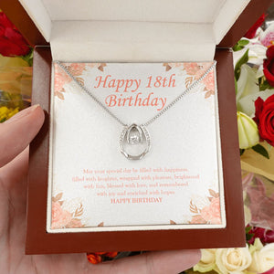 Enriched With Hopes horseshoe necklace luxury led box hand holding