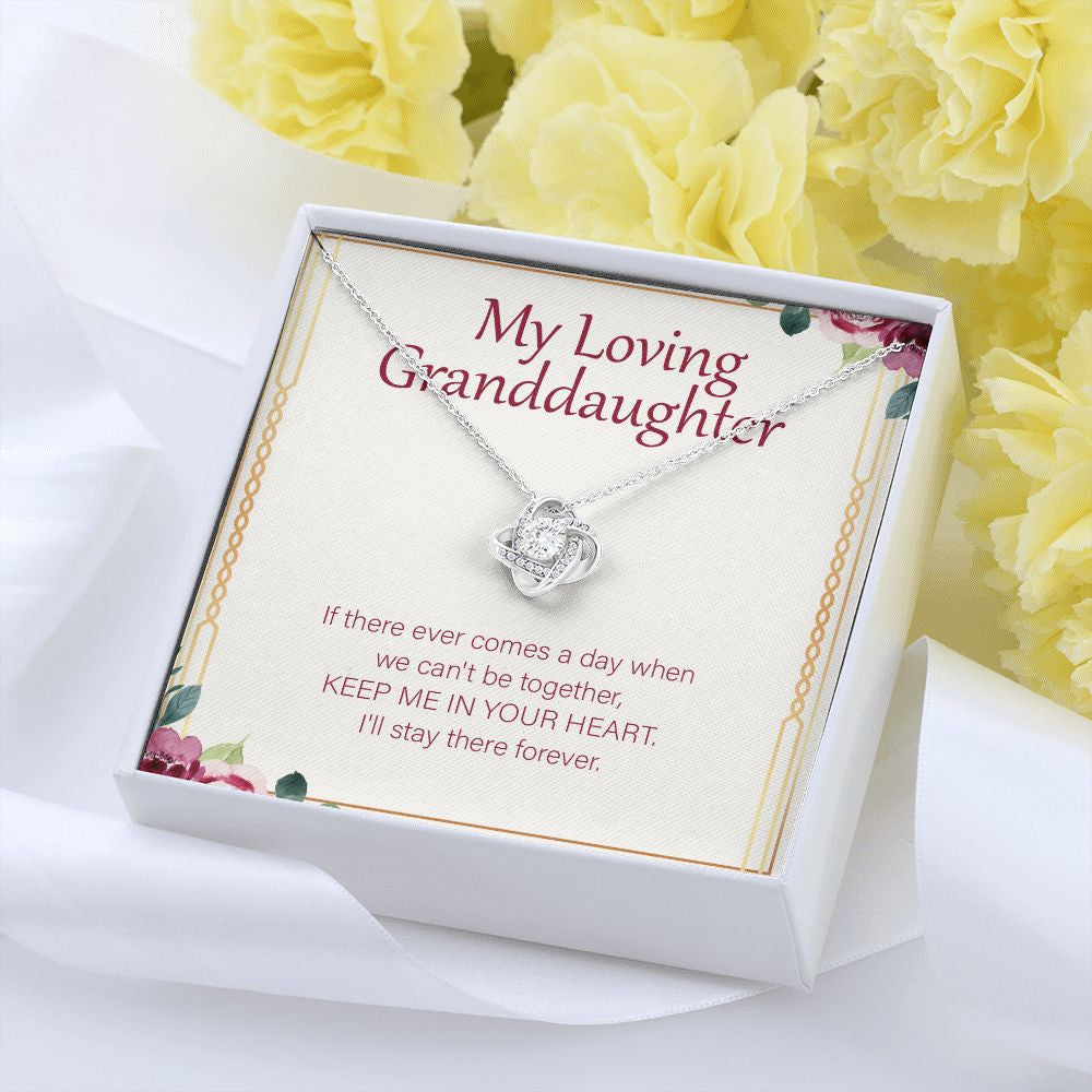 Keep Me In Your Heart love knot pendant yellow flower