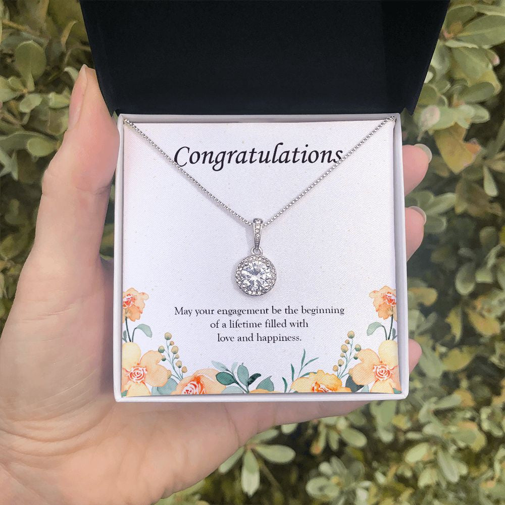 Beginning Of A Lifetime eternal hope necklace in hand
