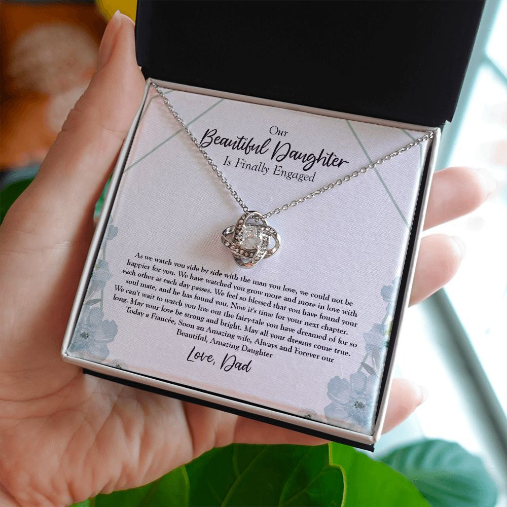 Fairy Tale Dream love knot necklace in hand
