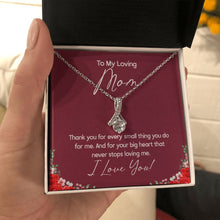 Load image into Gallery viewer, Small Things Big Heart alluring beauty necklace in hand
