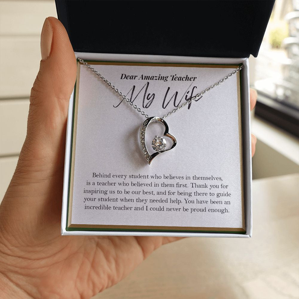 Behind Every Student forever love silver necklace in hand