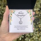 What Life Has To Offer eternal hope necklace in hand