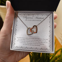 Load image into Gallery viewer, And You Did interlocking heart necklace in hand
