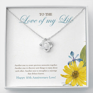 Another Year To Create Memories love knot necklace front