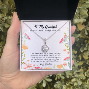 Carry You In My Heart eternal hope necklace in hand