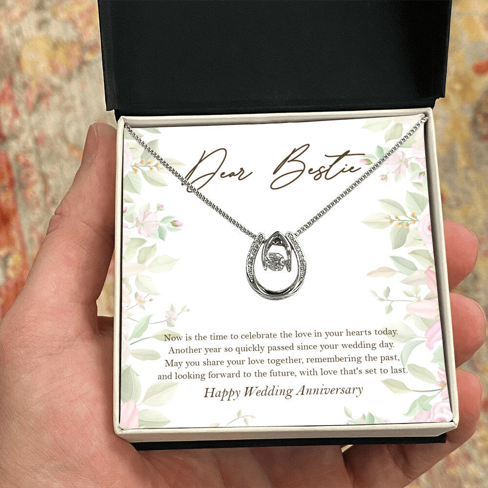 Love That Sets To Last horseshoe necklace in hand