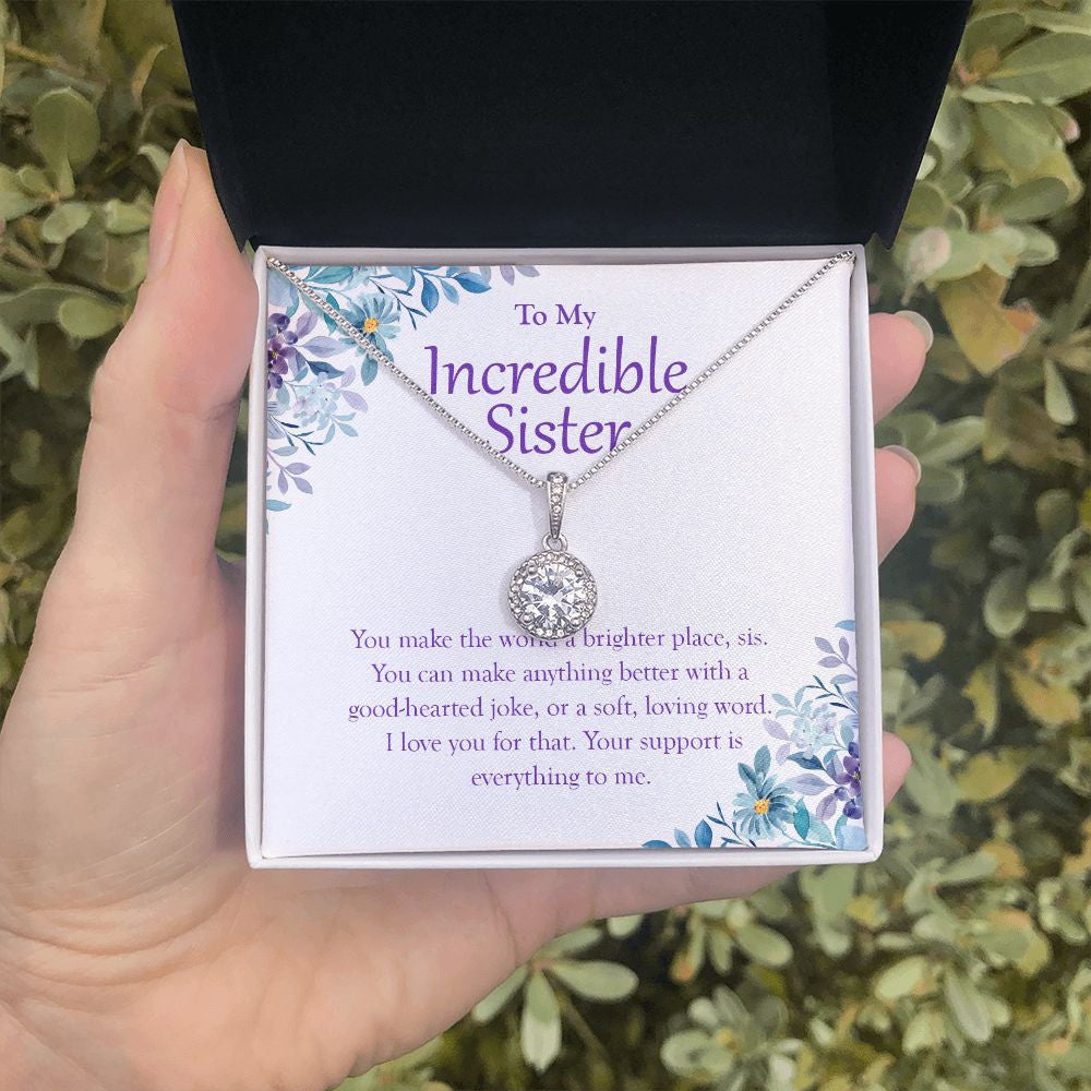 World A Brighter Place eternal hope necklace in hand